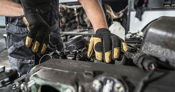 person repairing truck